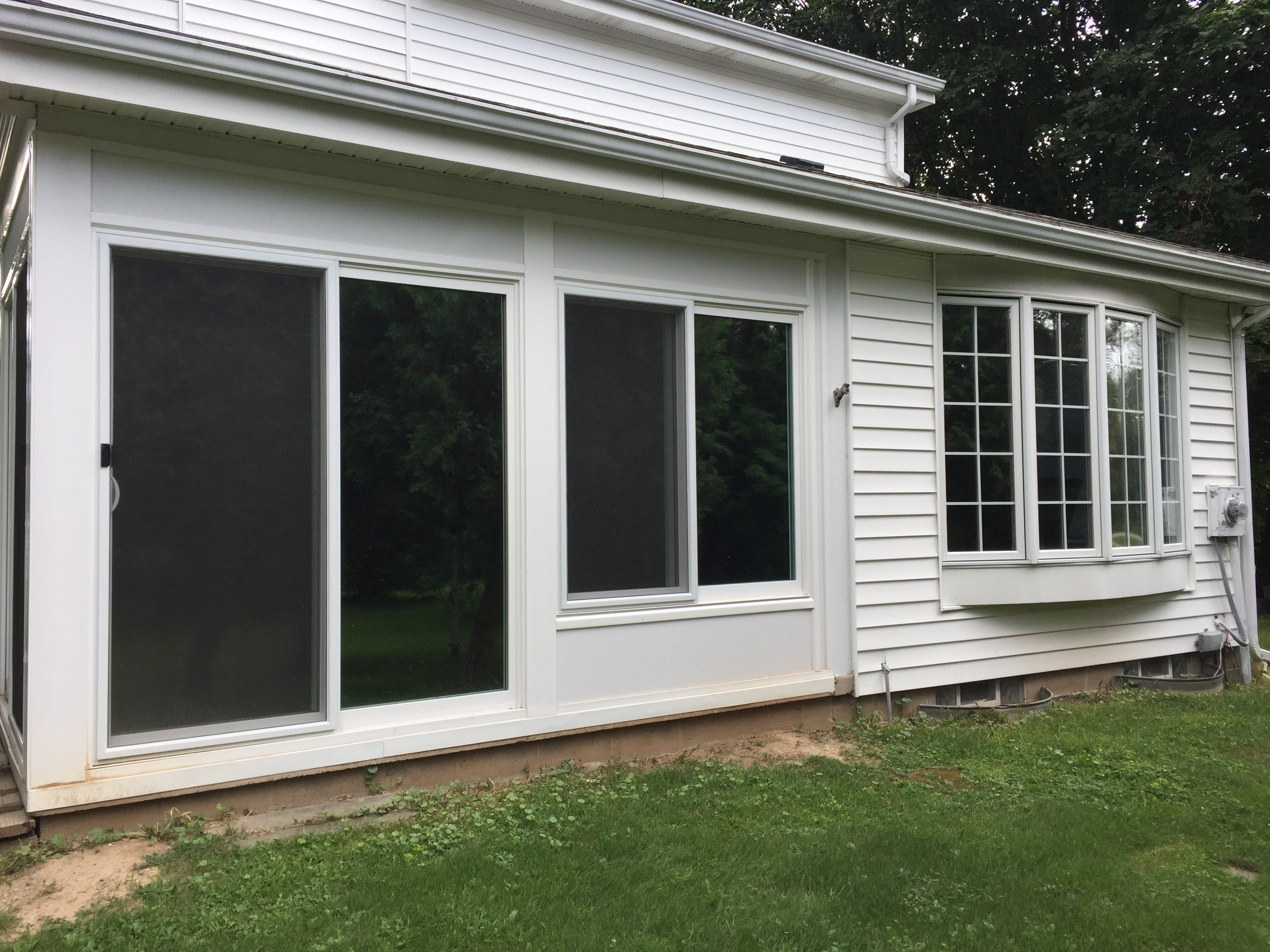 White house with sliding glass doors